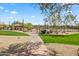 Beautiful community park with tennis courts, playground, and green space at 27582 N 67Th Way, Scottsdale, AZ 85266