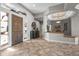 Spacious foyer with tiled floors, decorative glass, and an open floor plan at 27582 N 67Th Way, Scottsdale, AZ 85266