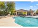 Outdoor pool featuring an adjacent hot tub, covered patio, and desert landscaping at 27582 N 67Th Way, Scottsdale, AZ 85266