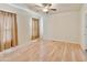 Bedroom featuring light wood floors and natural light at 2929 E Main St # 135, Mesa, AZ 85213