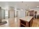 Bright living room with light wood floors and a kitchen island at 2929 E Main St # 135, Mesa, AZ 85213