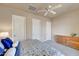 Bedroom featuring neutral walls, ceiling fan, carpet, and coordinated decor at 3109 W Summit Walk Ct, Anthem, AZ 85086