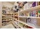 Walk-in pantry featuring extensive shelving for organized storage at 3109 W Summit Walk Ct, Anthem, AZ 85086