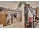 Spacious walk-in closet features ample shelving and hanging space, well-organized for clothes and accessories at 3109 W Summit Walk Ct, Anthem, AZ 85086