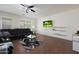 Inviting living room featuring modern decor and a ceiling fan at 3111 W Pleasant Ln, Phoenix, AZ 85041