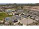 Aerial view of community amenities, pool, tennis, basketball, and volleyball at 34825 N Kaden Rd, San Tan Valley, AZ 85144