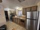 Functional kitchen with stainless steel appliances and ample cabinet space at 4065 E University Dr # 517, Mesa, AZ 85205