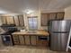 Functional kitchen equipped with essential appliances and ample counter space at 4065 E University Dr # 517, Mesa, AZ 85205