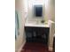 Stylish bathroom featuring a modern vanity with quartz countertop and dark wood cabinetry at 4112 N 11Th St, Phoenix, AZ 85014