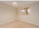 Bedroom with carpet floors, a ceiling fan, and a window with blinds, creating a comfortable and private space at 5345 E Mclellan Rd # 83, Mesa, AZ 85205