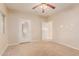 Bright bedroom with a door to the outside offering easy access to the backyard at 5345 E Mclellan Rd # 83, Mesa, AZ 85205