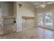 Inviting entryway featuring tile floors, staircase, and natural light from the glass patio doors at 5345 E Mclellan Rd # 83, Mesa, AZ 85205