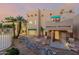 Southwestern-style home featuring a charming courtyard with desert landscaping and unique architectural details at 5345 E Mclellan Rd # 83, Mesa, AZ 85205