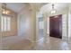 Inviting foyer featuring tile flooring, neutral walls, arches and a view into other rooms at 5345 E Mclellan Rd # 83, Mesa, AZ 85205