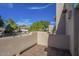 Outdoor patio featuring wooden flooring and privacy walls, perfect for relaxation at 5345 E Mclellan Rd # 83, Mesa, AZ 85205