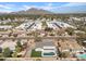 Stunning aerial view of home with in-ground pool and beautiful desert landscaping at 5927 E Edgemont Ave, Scottsdale, AZ 85257