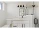 Bathroom featuring walk-in shower, stylish vanity, and modern fixtures at 5927 E Edgemont Ave, Scottsdale, AZ 85257