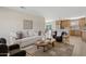 Bright living room with a neutral color palette, plush seating, and open floor plan at 5927 E Edgemont Ave, Scottsdale, AZ 85257