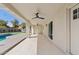 Covered outdoor patio with ceiling fans and views of the backyard pool at 5927 E Edgemont Ave, Scottsdale, AZ 85257