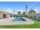 Beautiful pool with ample deck space and well-manicured turf, ideal for enjoying sunny days at 5927 E Edgemont Ave, Scottsdale, AZ 85257