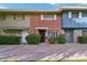 Cozy townhome featuring well-maintained landscaping and colorful exterior at 6169 N Granite Reef Rd, Scottsdale, AZ 85250