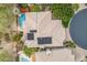 Expansive aerial view of the property showcasing a private pool, desert landscaping, and solar panels for energy efficiency at 6508 N 28Th St, Phoenix, AZ 85016