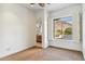 Bedroom features a scenic view, leading to a peek into the attached bathroom at 6508 N 28Th St, Phoenix, AZ 85016