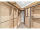 Spacious walk-in closet with custom shelving and drawers for optimal storage at 6508 N 28Th St, Phoenix, AZ 85016