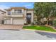 Stunning two-story home featuring a well-manicured lawn, three-car garage, and a grand entrance, exuding curb appeal at 6508 N 28Th St, Phoenix, AZ 85016