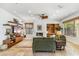 Cozy living room with a modern fireplace, mounted TV, floating shelves, and built-in cabinets, creating a welcoming space at 6508 N 28Th St, Phoenix, AZ 85016