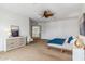 Large main bedroom with neutral walls, a ceiling fan, and plenty of natural light from windows with shutters at 6508 N 28Th St, Phoenix, AZ 85016