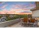 Charming patio area with a dining table and seating, perfect for enjoying the incredible views at 6508 N 28Th St, Phoenix, AZ 85016