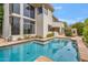 Gorgeous pool with a view of the home's architectural details, perfect for relaxation and enjoying the outdoors at 6508 N 28Th St, Phoenix, AZ 85016