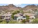 View of home with a covered balcony, mountain views and swimming pool at 6508 N 28Th St, Phoenix, AZ 85016