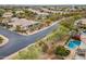 Street view of desert community with homes, desert landscaping and a pool at 6508 N 28Th St, Phoenix, AZ 85016