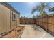 The backyard features storage and a wood fence at 6711 W Osborn Rd # 127, Phoenix, AZ 85033