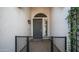 Stylish front door with decorative features and a welcoming gated entry at 737 E Boston St, Gilbert, AZ 85295