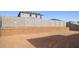 Large backyard with block fence and dirt at 7400 W Quail Track Dr, Peoria, AZ 85383