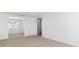 Bedroom featuring neutral carpet, a walk-in closet and natural light from the window at 7400 W Quail Track Dr, Peoria, AZ 85383