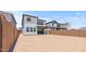 The backyard has a covered patio and an expansive dirt area ready for your landscaping dreams at 7987 W Griswold Rd, Peoria, AZ 85345