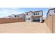 The backyard has a covered patio and an expansive dirt area ready for your landscaping dreams at 7987 W Griswold Rd, Peoria, AZ 85345