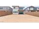 The backyard has a covered patio and an expansive dirt area ready for your landscaping dreams at 7987 W Griswold Rd, Peoria, AZ 85345