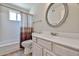 Bathroom featuring a single sink, vanity, and shower-tub combo at 8347 W Taro Ln, Peoria, AZ 85382