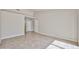 Spacious bedroom featuring tile flooring and bright natural light at 8347 W Taro Ln, Peoria, AZ 85382