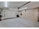 A spacious garage with cabinets and utility sink at 8347 W Taro Ln, Peoria, AZ 85382