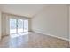 Bright living room with sliding glass door to outdoor space at 8347 W Taro Ln, Peoria, AZ 85382