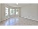 Bright living room featuring tile floors and many windows at 8347 W Taro Ln, Peoria, AZ 85382