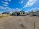 View of the backyard with solar panels at 8350 W Monroe St, Peoria, AZ 85345