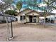 Modest single-story home with covered porch, showing its potential in a quaint setting at 8350 W Monroe St, Peoria, AZ 85345