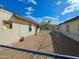 Side yard enclosed by a chain-link fence at 8350 W Monroe St, Peoria, AZ 85345